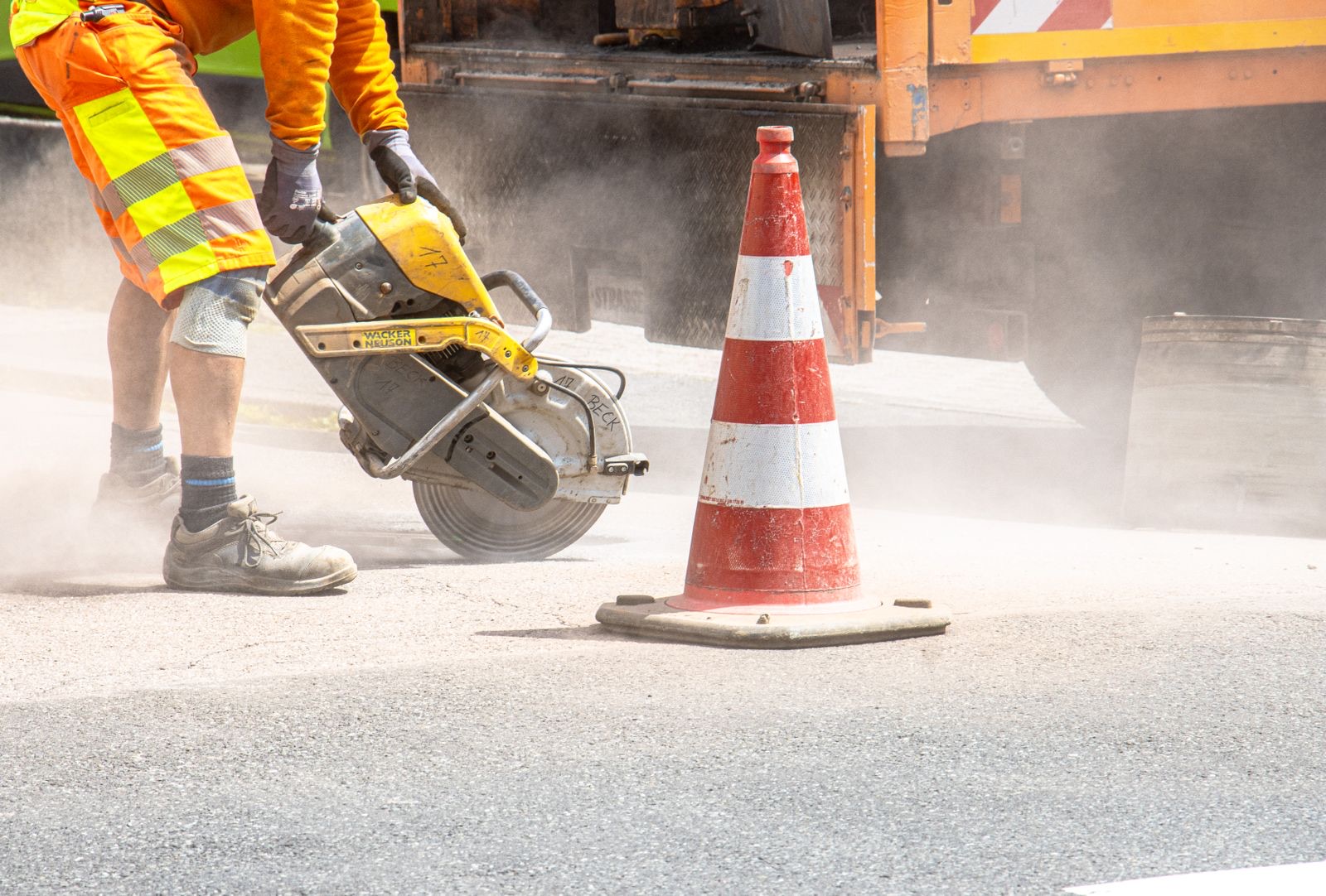 Concrete being cut with a saw on a London construction site