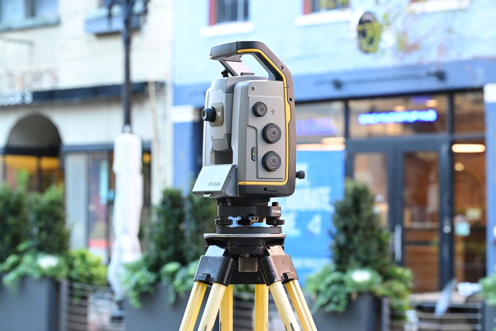 Survey-grade scanning instrument capturing a building